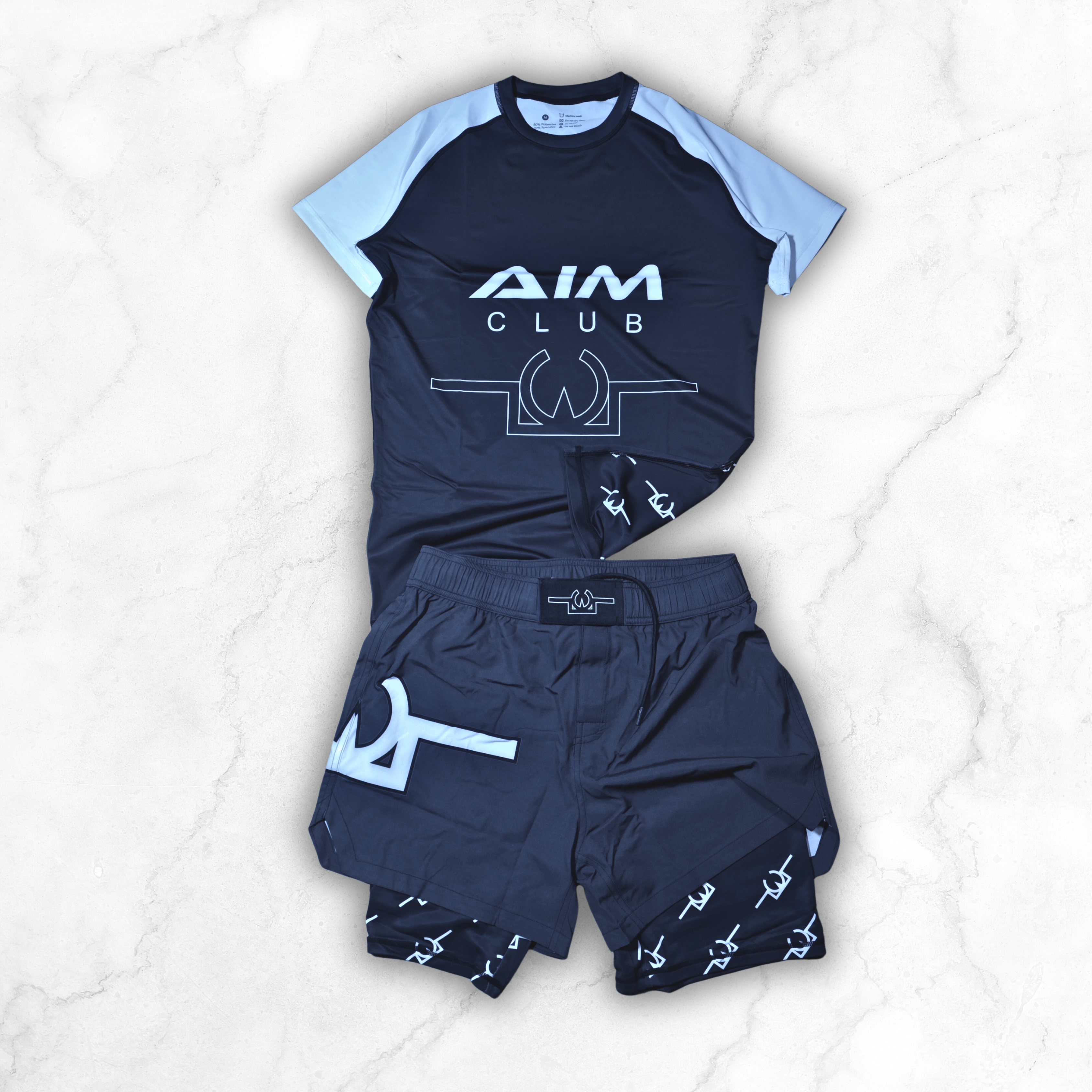 AIM CLUB - RASH GUARD X COMBAT SHORT